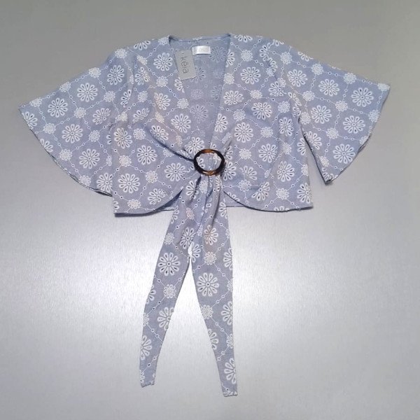 BLUSA NUDO OJALILLO CELESTE