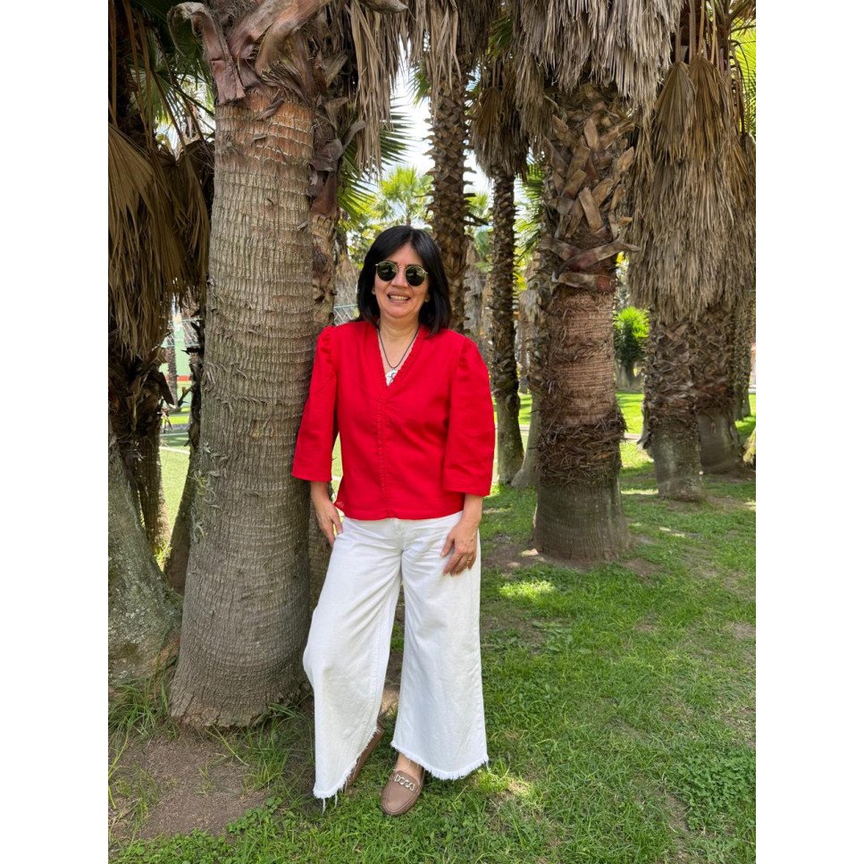 BLUSA ROJA VUELOS
